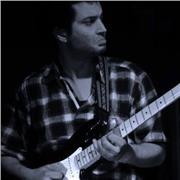 professeur de guita donne cours de guitar en ligne